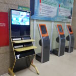 customer photo_travelers using free charging station service hanoi train station