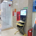 customer photo_travelers using free charging station service hanoi train station
